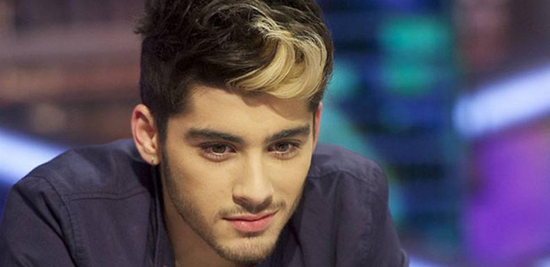 Zayn Malik publicó en su twitter una foto donde aparece firmando contrato con nueva disquera/ Foto: billboard.com